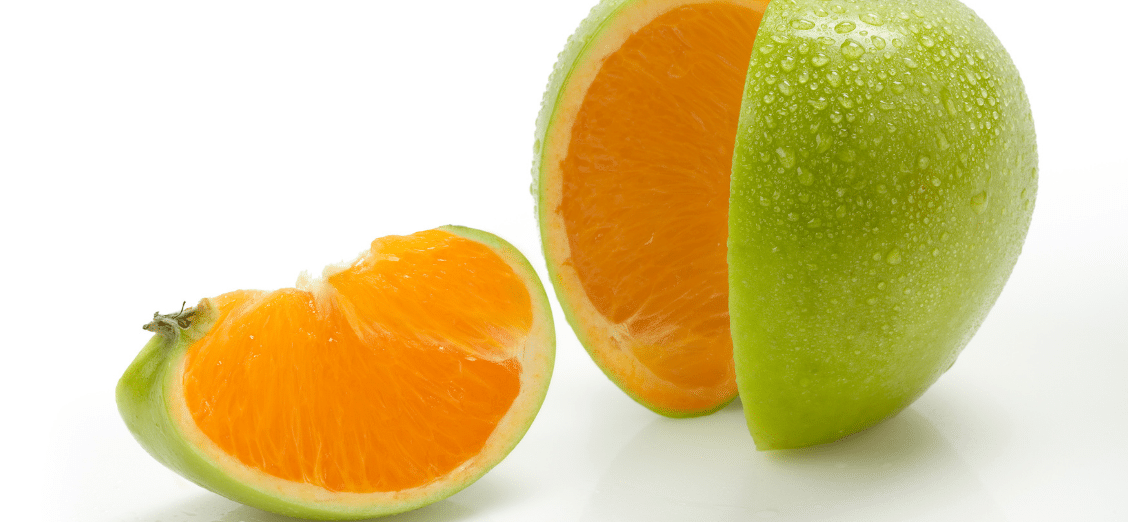 image of a green apple with an orange inside