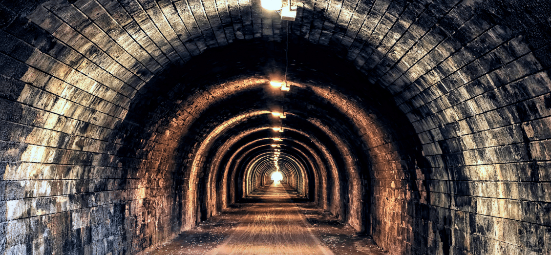 Tunnel with light at the end photo | Strata.io