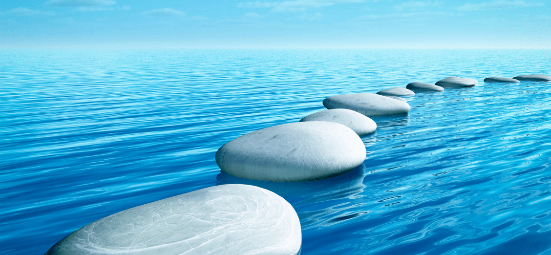 Stepping stones in azure blue water